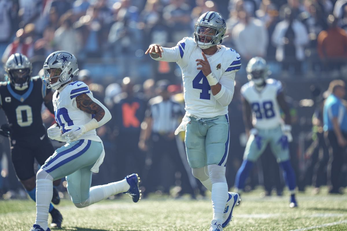 Dallas Cowboys quarterback Dak Prescott throws a pass during the first quarter against the Carolina Panthers at Bank of America Stadium.