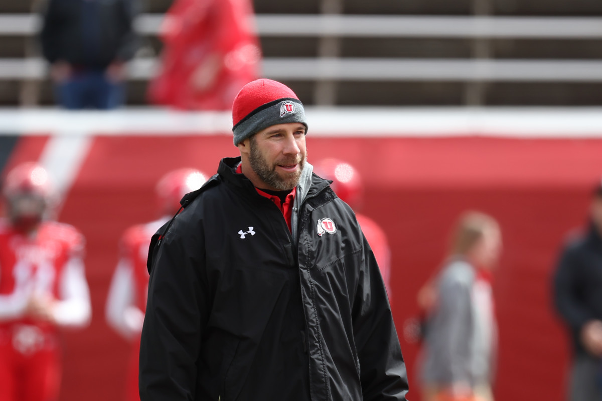 Apr 23, 2022; Salt Lake City, Utah, USA; Utah Utes defensive coordinator Morgan Scalley watches the team warm up prior to the Utah Spring Football Game at Rice Eccles Stadium. Mandatory Credit: Rob Gray-USA TODAY Sports