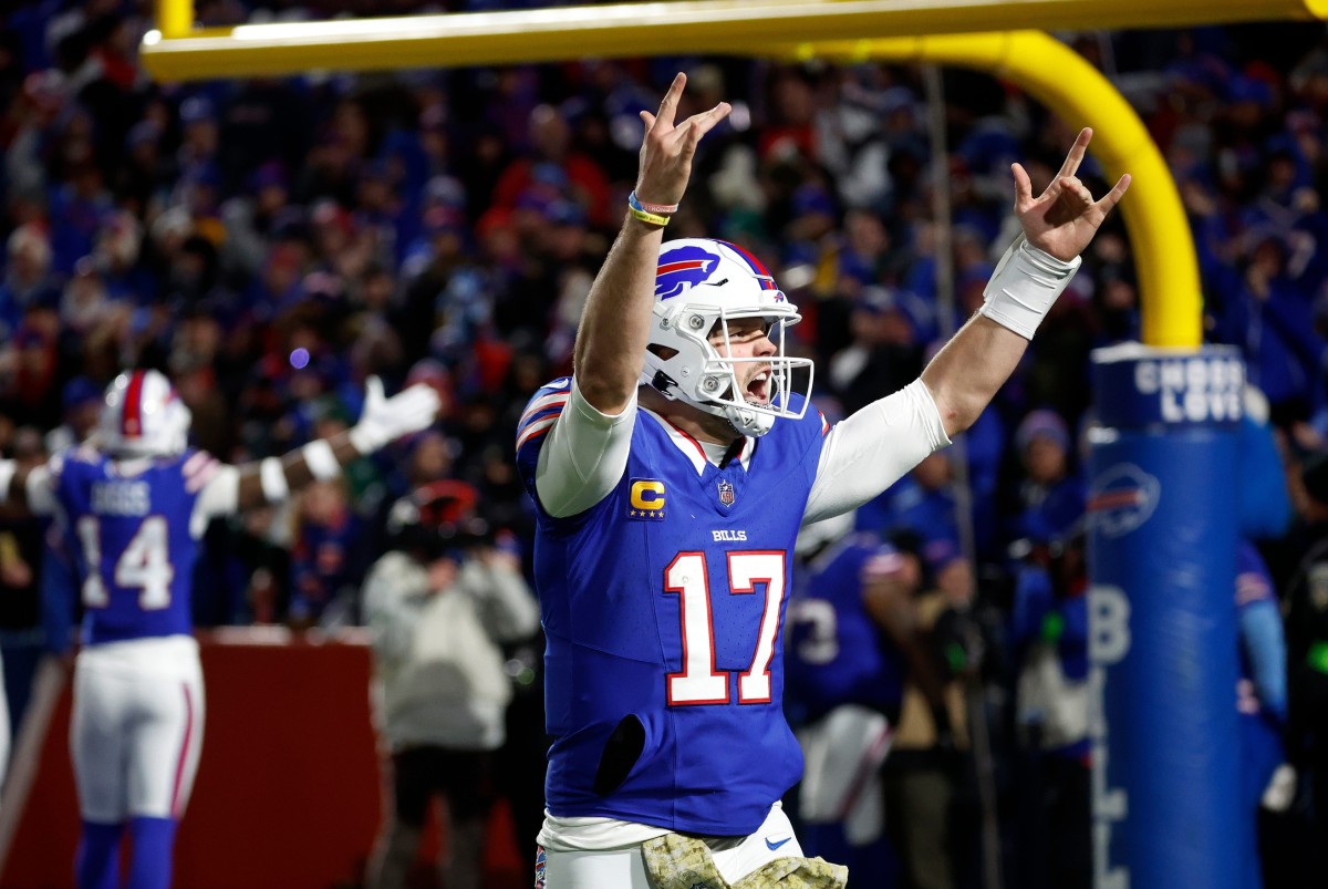Bills quarterback Josh Allen pumps up the fans after Buffalo's rout of the Jets in Week 11.
