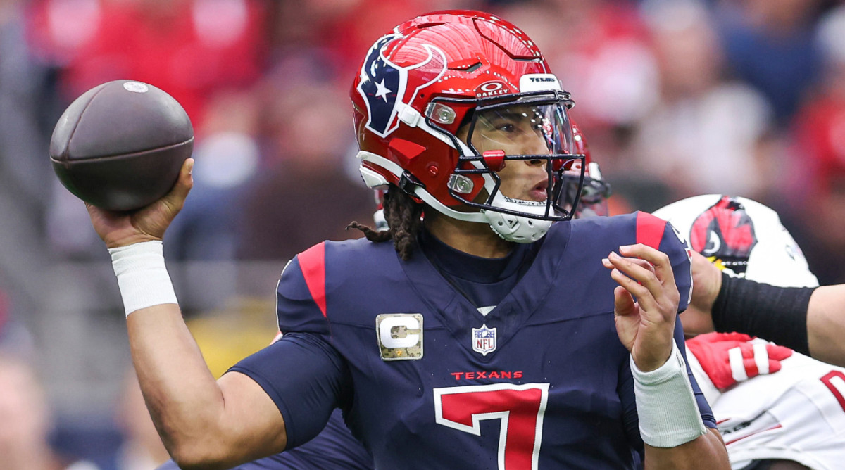 Texans quarterback C.J. Stroud looks to throw a pass during a game.