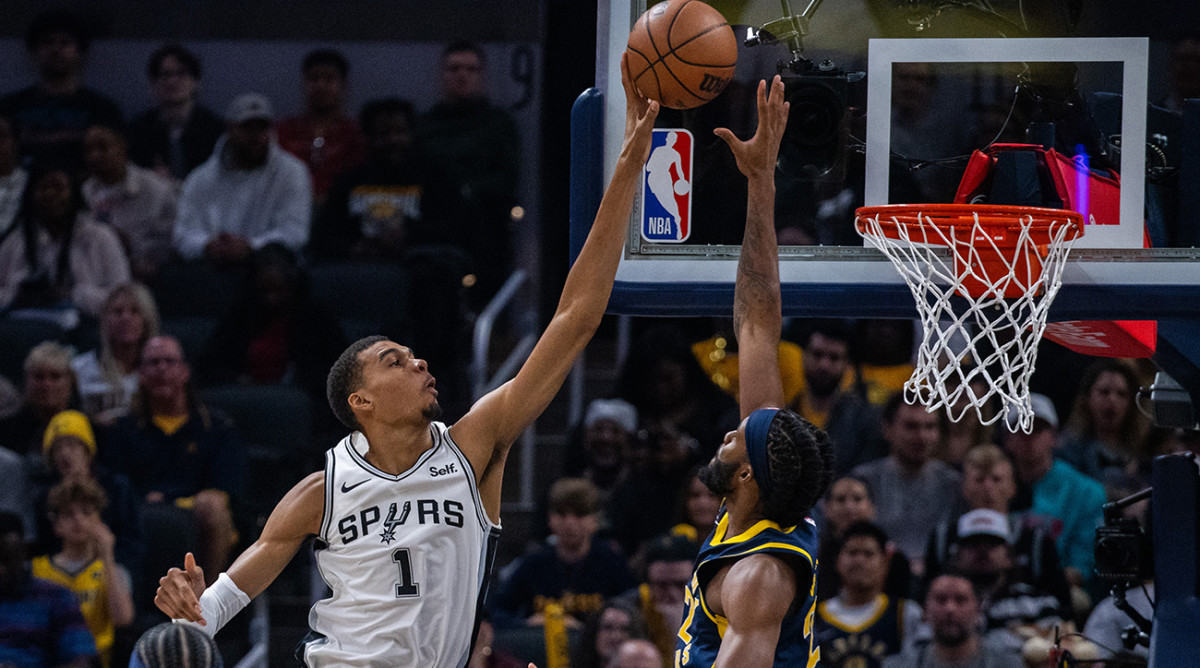 Spurs center Victor Wembanyama (1) shoots the ball while Pacers forward Isaiah Jackson (22) defends in the first half at Gainbridge Fieldhouse.