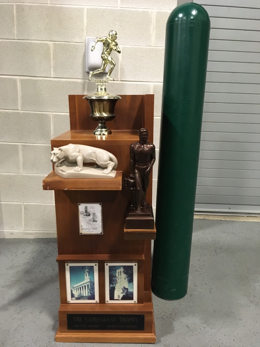 The Land Grant Trophy is presented to the winner of the Penn State vs. Michigan State college football game.