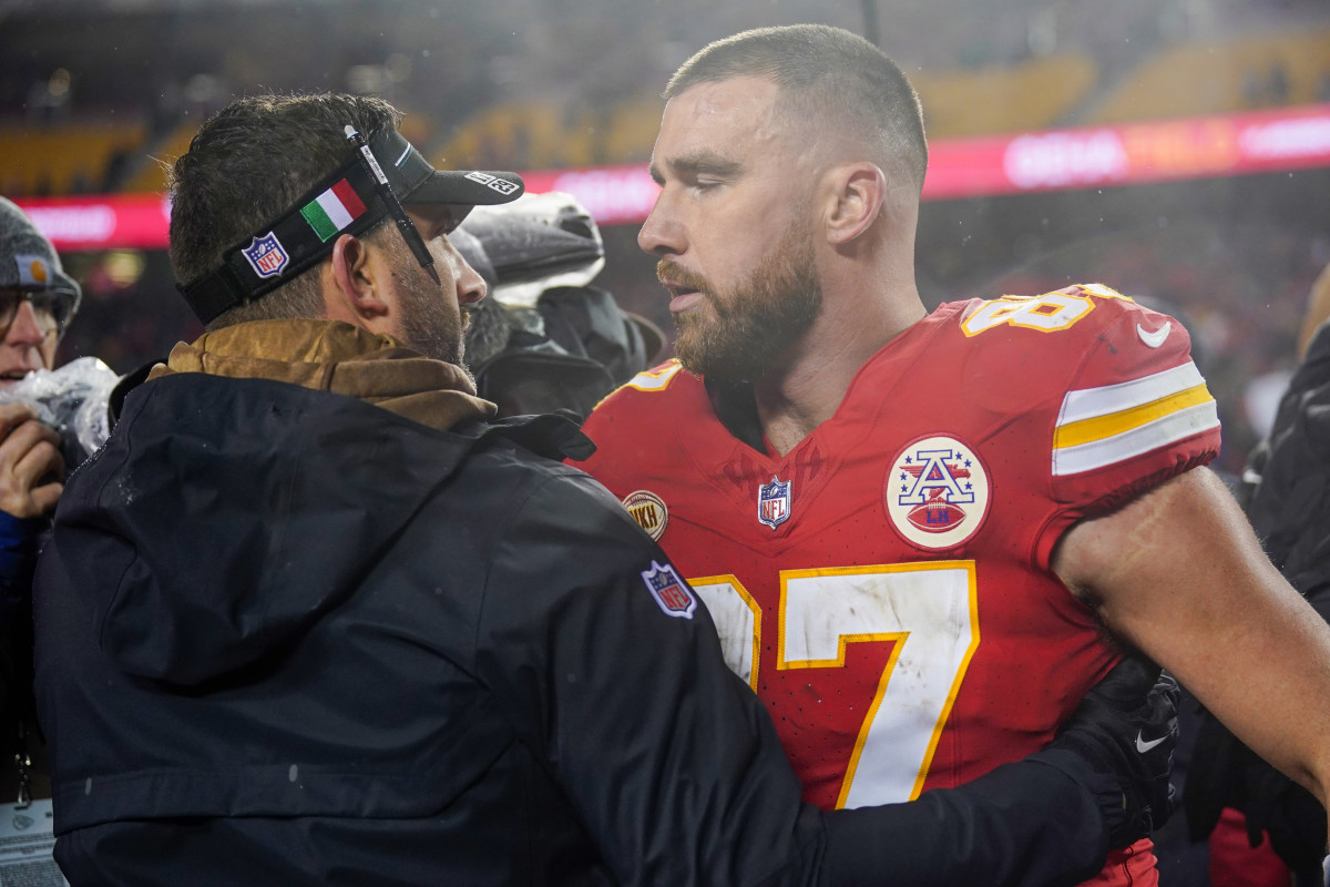 Kansas City Chiefs tight end Travis Kelce talks with Philadelphia Eagles head coach Nick Sirianni after the game at GEHA Field at Arrowhead Stadium.