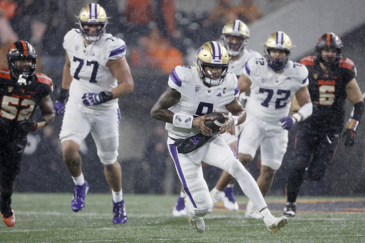 Nov 18, 2023; Corvallis, Oregon, USA; Washington Huskies quarterback Michael Penix Jr. (9) runs the ball during the first half against the Oregon State Beavers at Reser Stadium.