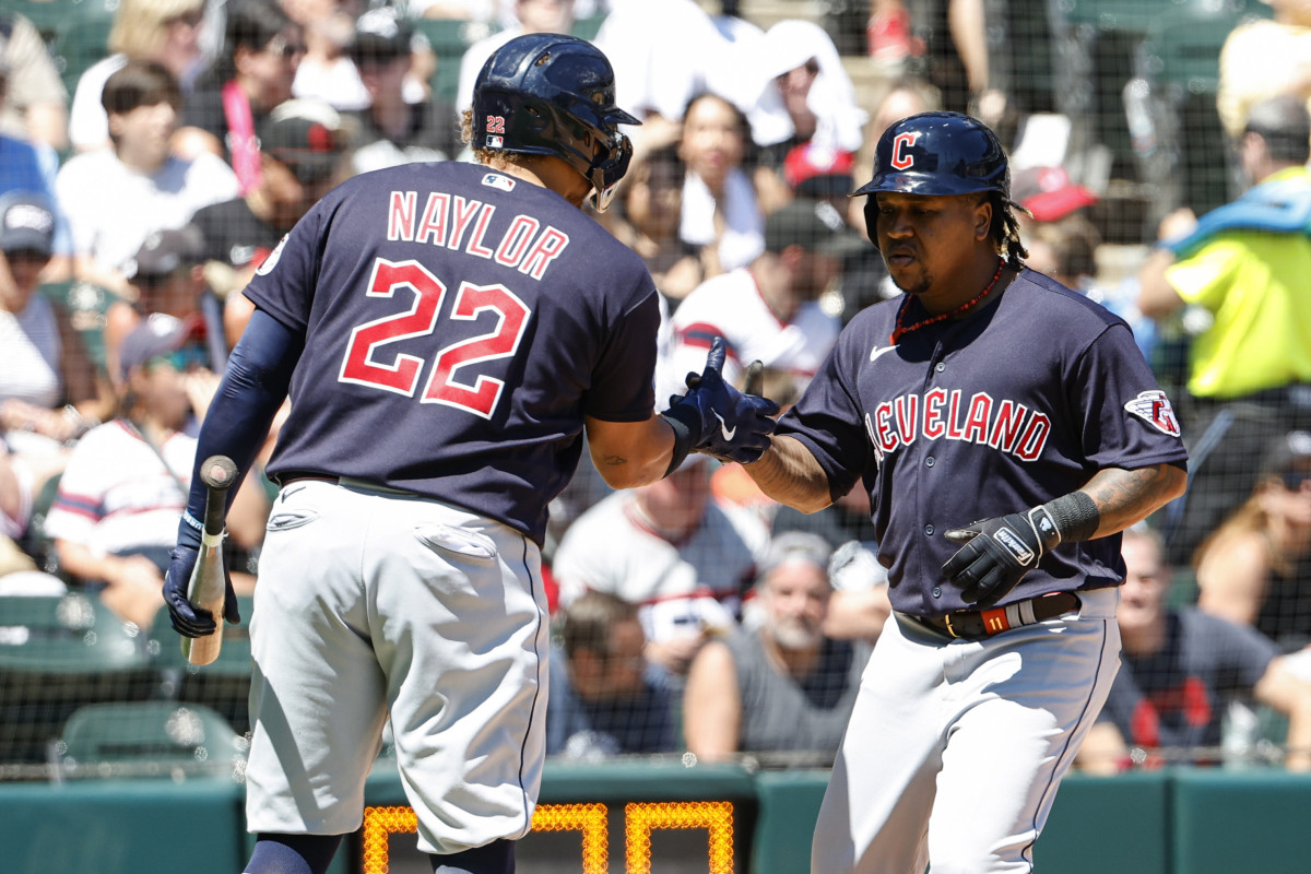 Jul 30, 2023; Chicago, Illinois, USA; Cleveland Guardians third baseman Jose Ramirez (11) celebrates with first baseman Josh Naylor (22) after hitting a solo home run against the Chicago White Sox during the fifth inning at Guaranteed Rate Field.