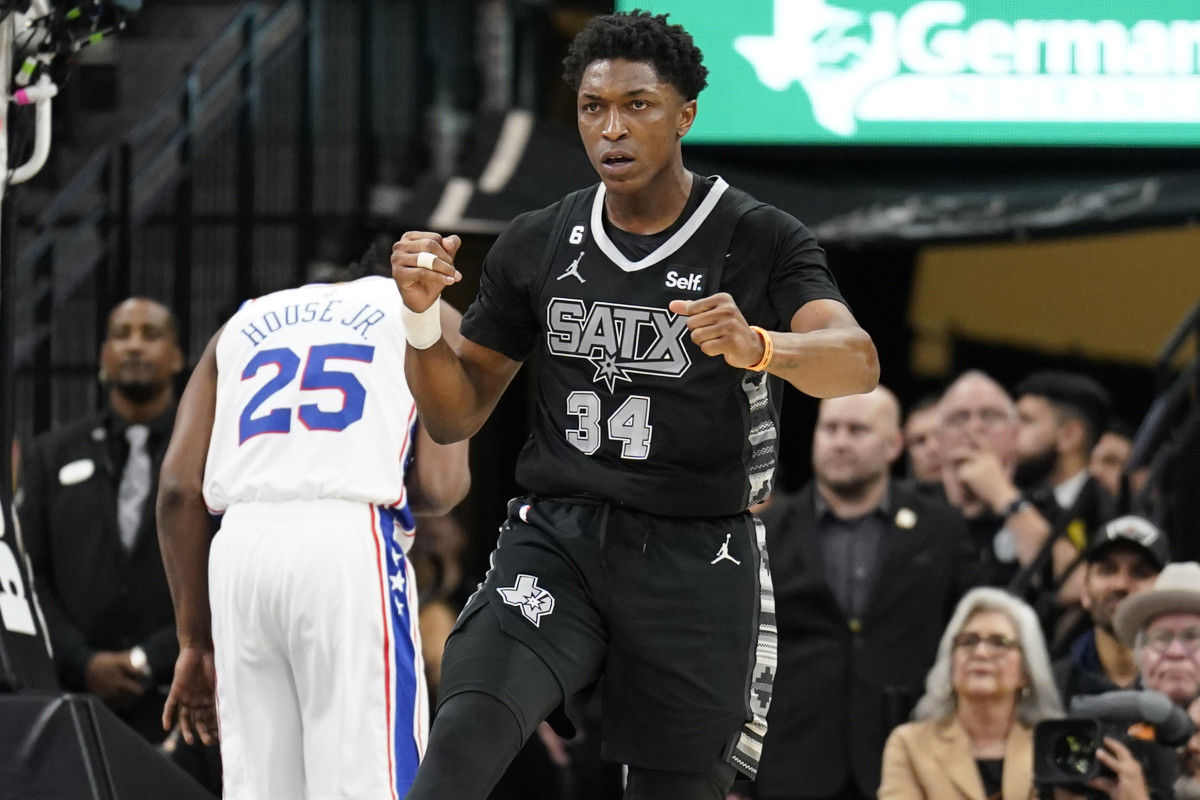 San Antonio Spurs forward Stanley Johnson (34) reacts after being fouled