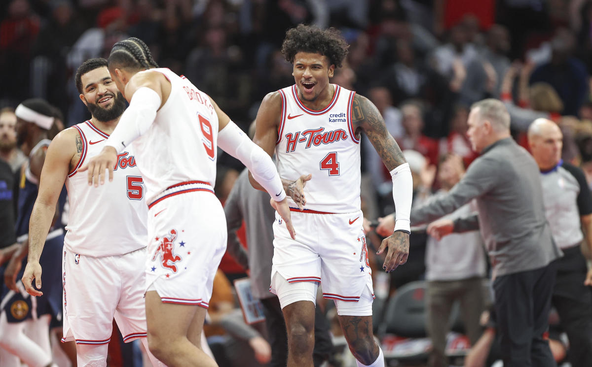 Houston Rockets guard Jalen Green (4) reacts after scoring during the fourth quarter against the Denver Nuggets at Toyota Center.