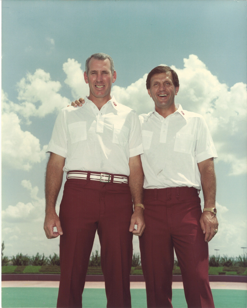 Former Texas A&M Aggies coach Jackie Sherrill poses for a photo with then-defensive coordinator R.C. Slocum