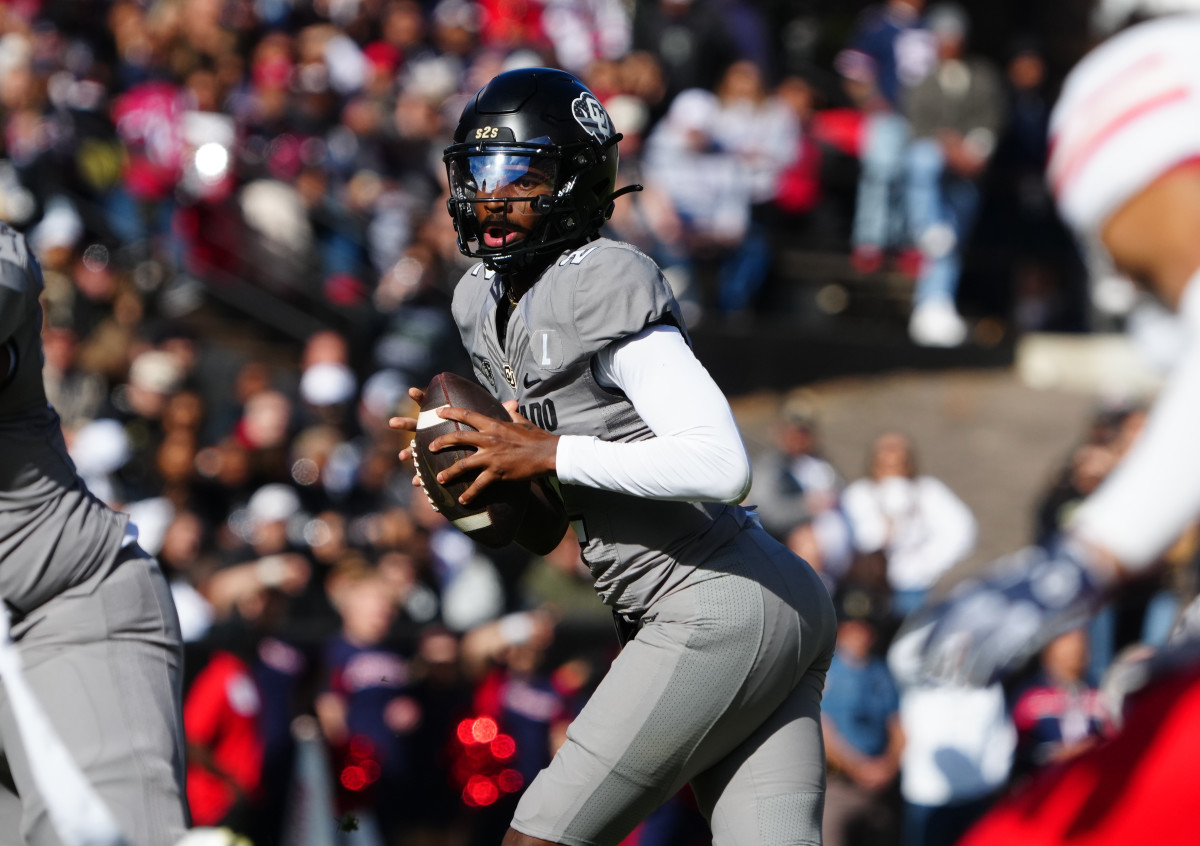 Colorado Buffaloes quarterback Shedeur Sanders (2) looks to pass in the first half against the Arizona Wildcats at Folsom Field