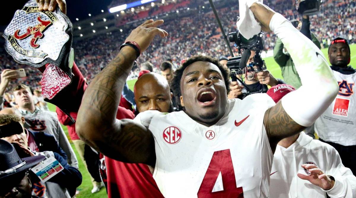 Jalen Milroe celebrates after Alabama's comeback win against Auburn.