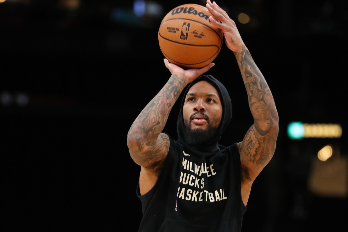 Milwaukee Bucks guard Damian Lillard (0) warms up 