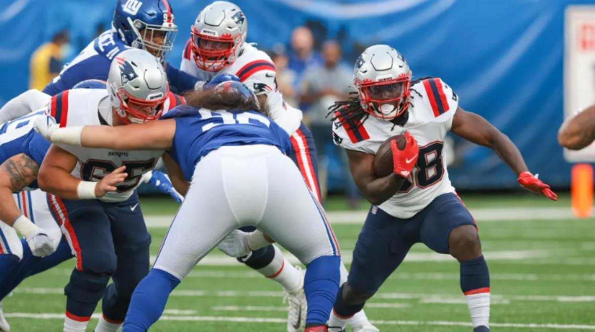 Rhadmondre Stevenson carries vs. the Giants in a 2021 preseason game