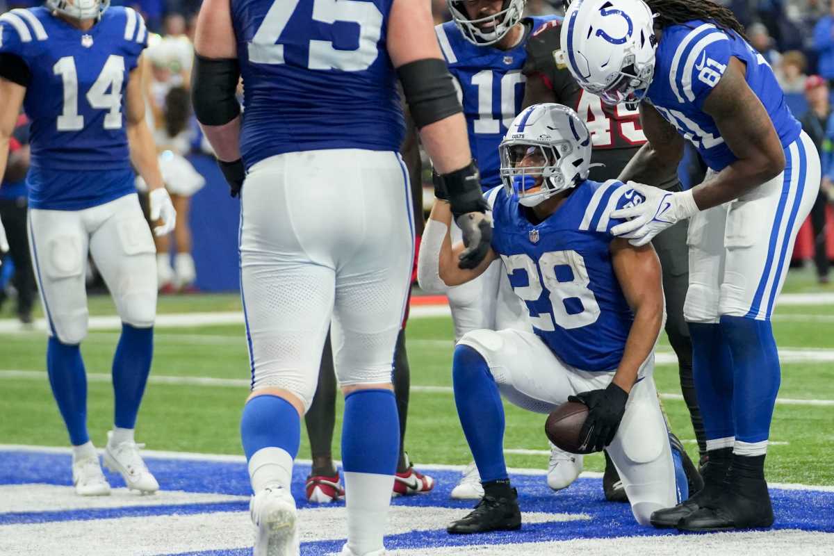 Indianapolis Colts running back Jonathan Taylor (28) scores a touchdown Sunday, Nov. 26, 2023, during a game against the Tampa Bay Buccaneers at Lucas Oil Stadium in Indianapolis.  