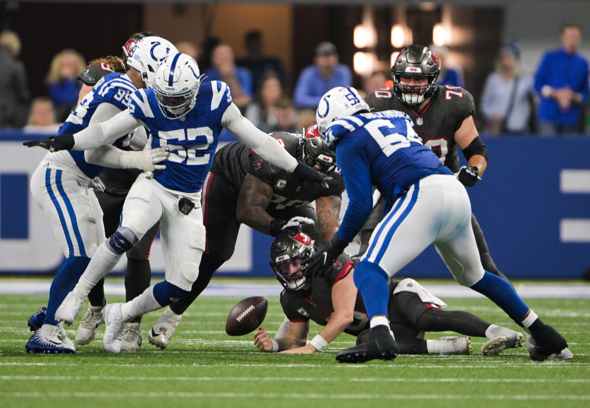 Nov 26, 2023; Indianapolis, Indiana, USA; Tampa Bay Buccaneers quarterback Baker Mayfield (6) is sacked and fumbles the ball toward the end of the second half against the Indianapolis Colts at Lucas Oil Stadium.