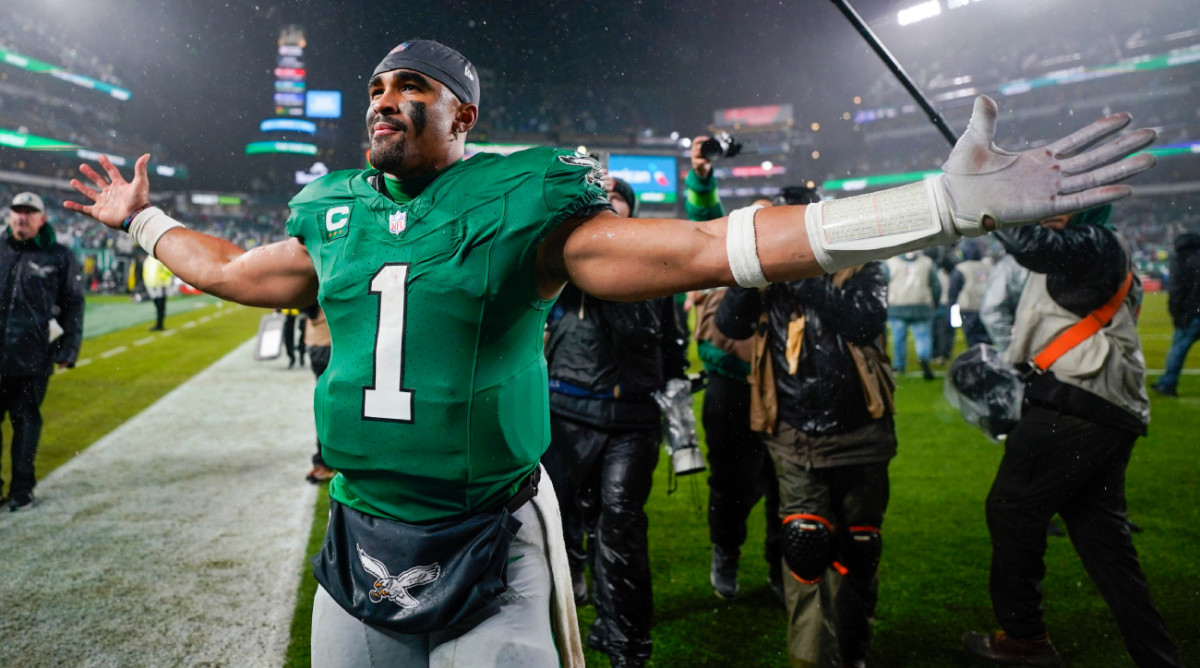 Philadelphia Eagles quarterback Jalen Hurts celebrates after scoring the game winning touchdown against the Buffalo Bills during overtime in an NFL football game Sunday, Nov. 26, 2023, in Philadelphia. (AP Photo/Matt Slocum)   