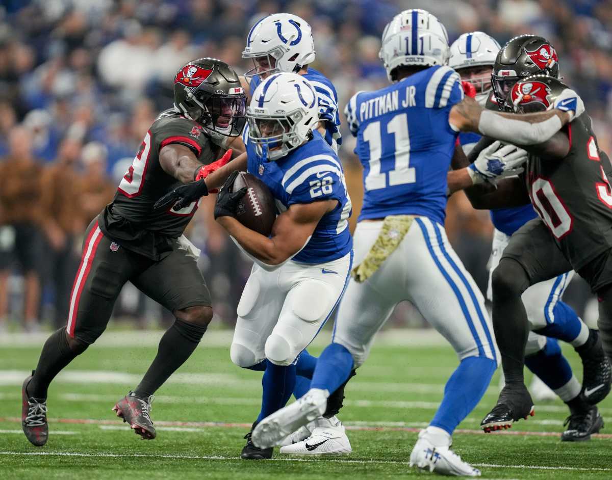 Indianapolis Colts running back Jonathan Taylor (28) rushes the ball Sunday, Nov. 26, 2023, during a game against the Tampa Bay Buccaneers at Lucas Oil Stadium in Indianapolis.