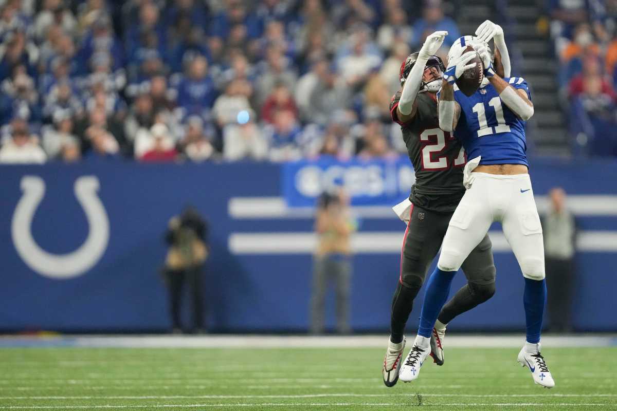 Indianapolis Colts wide receiver Michael Pittman Jr. (11) makes a catch in front of Tampa Bay Buccaneers cornerback Zyon McCollum (27) on Sunday, Nov. 26, 2023, during a game against the Tampa Bay Buccaneers at Lucas Oil Stadium in Indianapolis.  