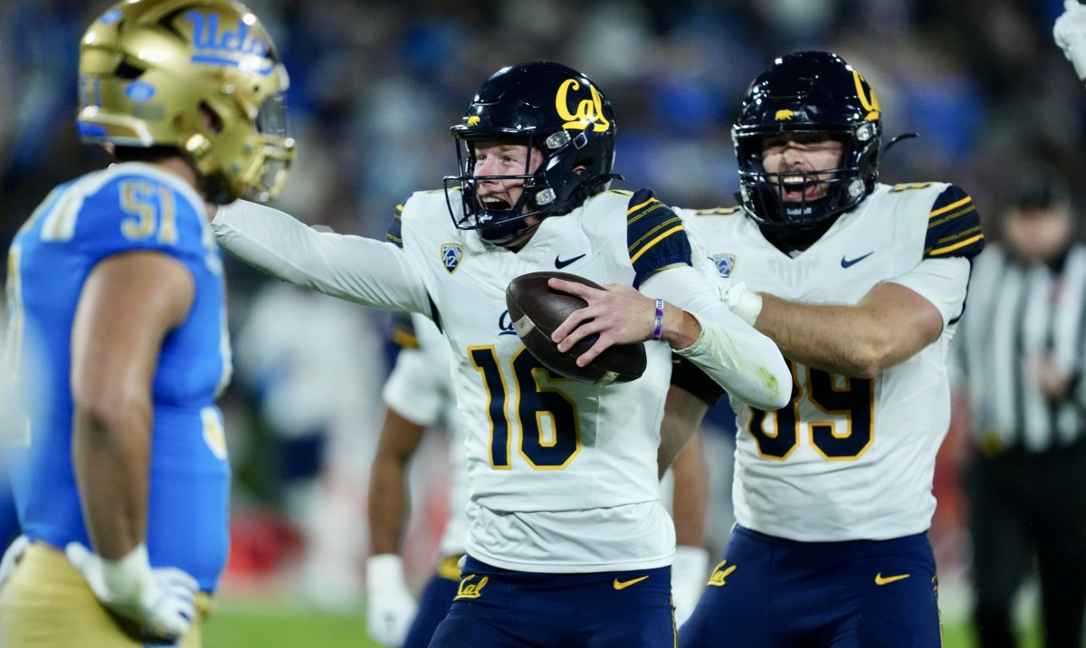 Michael Luckhurst celebrates recovering a fumble.