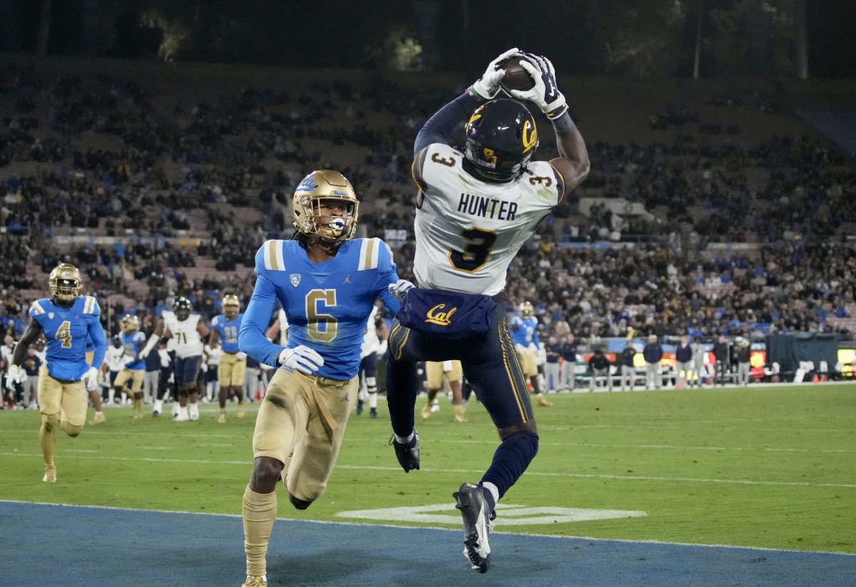 Jeremiah Hunter catches one of his two TD passes vs.UCLA