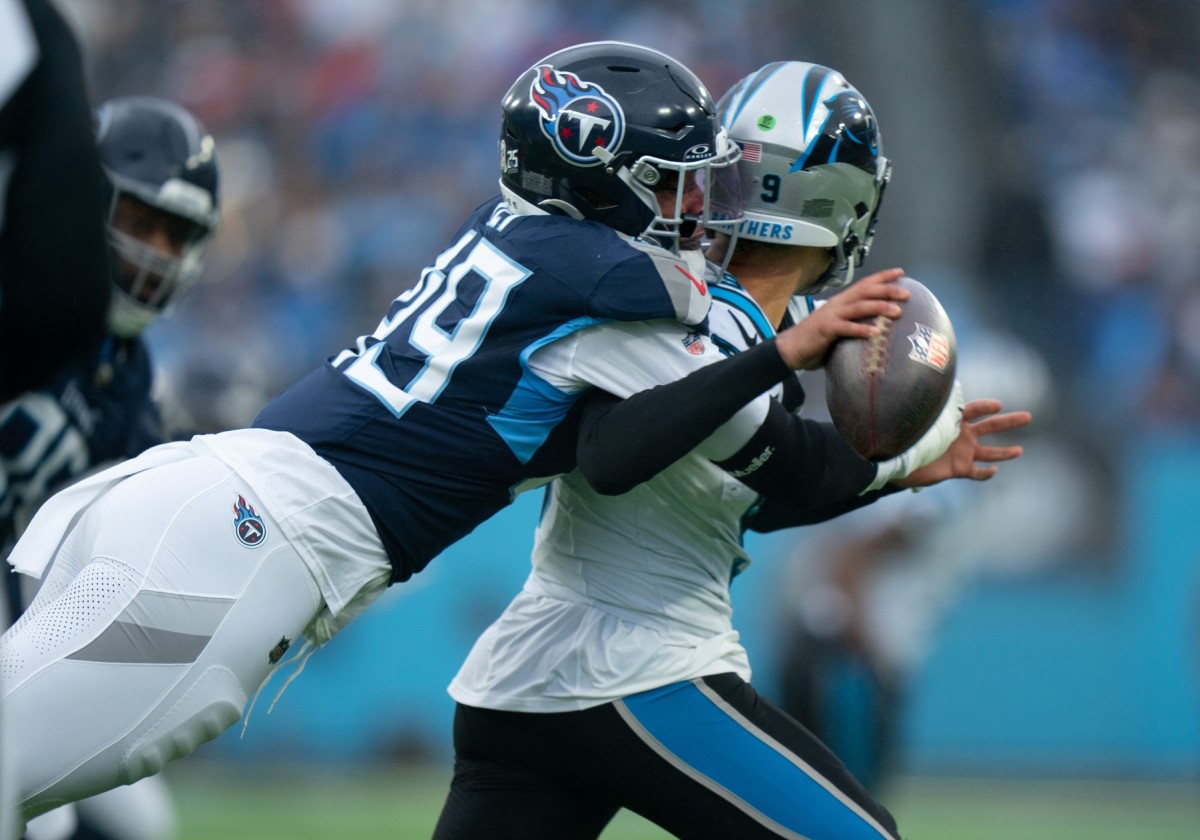 Tennessee Titans linebacker Arden Key (49) sacks Carolina Panthers quarterback Bryce Young (9) and created a fumble during their game at Nissan Stadium.