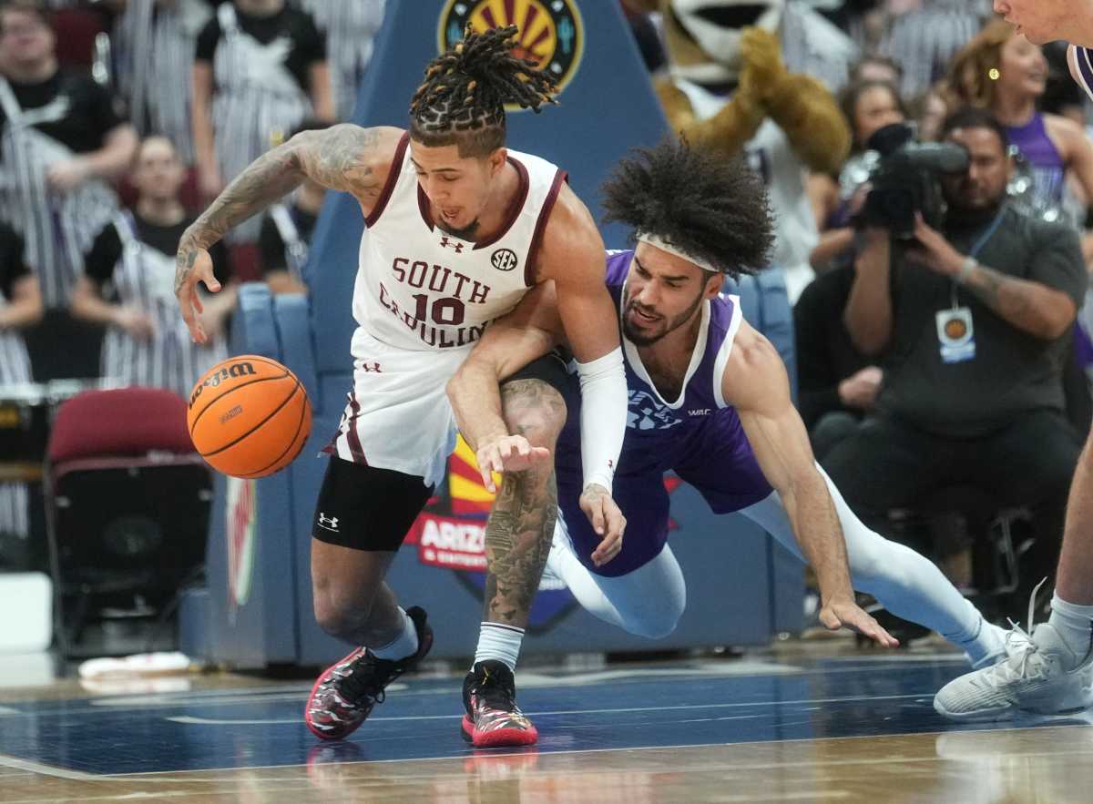 Gamecock wing Myles Stute fights to maintain his dribble through contact vs. Grand Canyon in the Arizona Tip-Off Invitational (19th Nov., 2023)