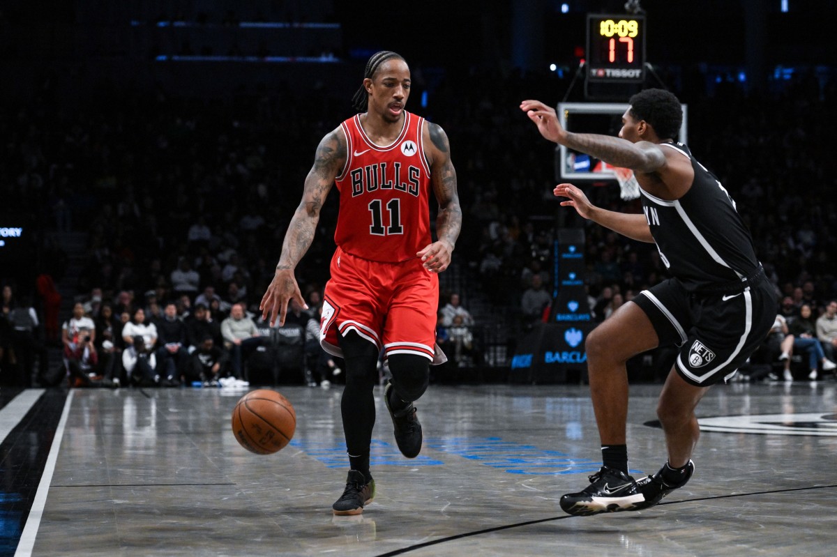 Chicago Bulls forward DeMar DeRozan (11) dribbles as Brooklyn Nets guard Armoni Brooks (13) defends during the fourth quarter at Barclays Center.