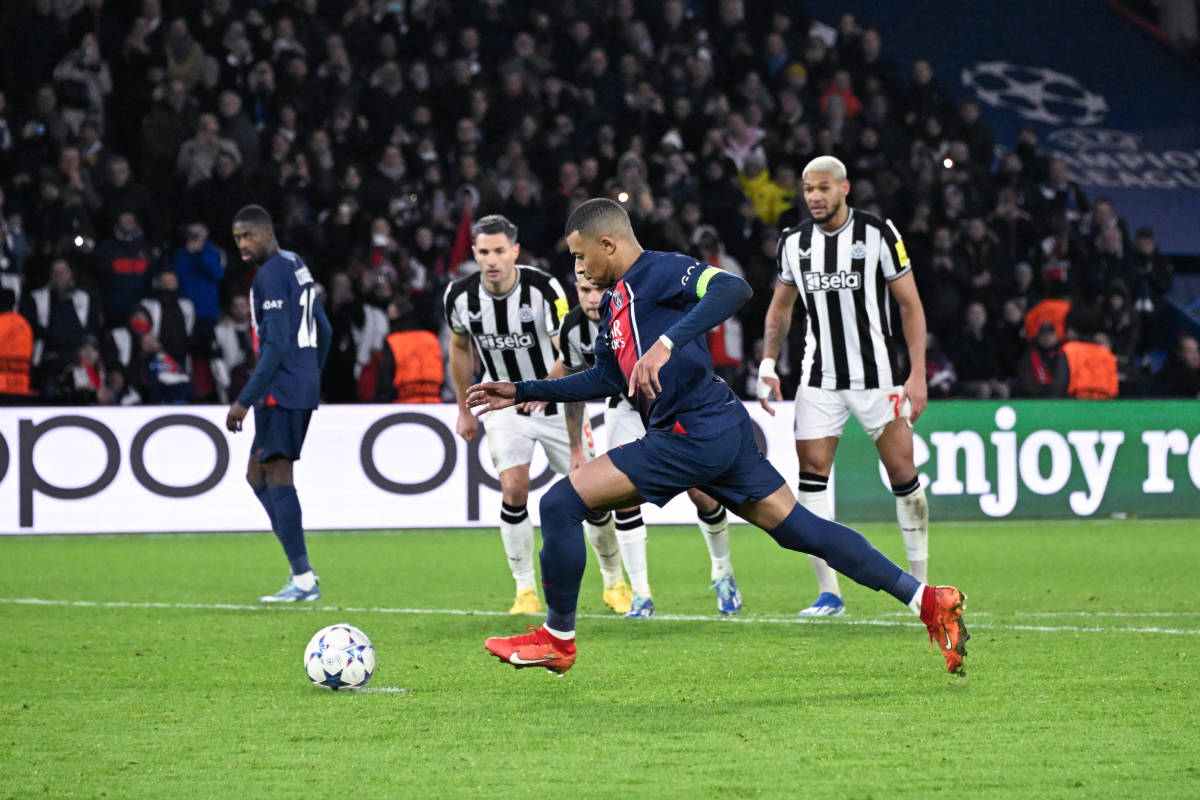 Kylian Mbappe pictured taking a penalty to score for PSG in a 1-1 draw with Newcastle in Paris in November 2023