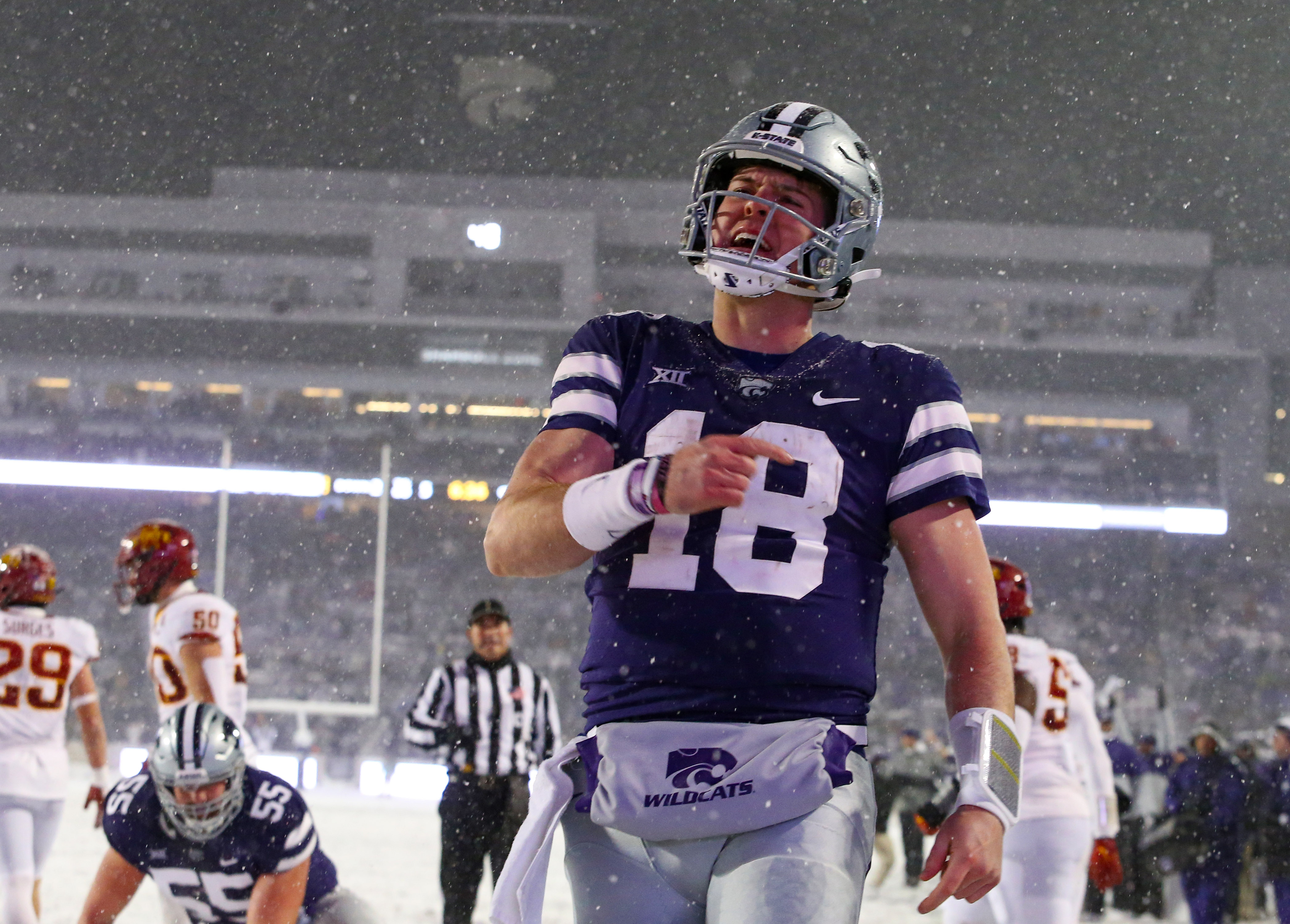 Nov 25, 2023; Manhattan, Kansas, USA; Kansas State Wildcats quarterback Will Howard (18) celebrates a touchdown in the third quarter against the Iowa State Cyclones at Bill Snyder Family Football Stadium. Mandatory Credit: Scott Sewell-USA TODAY Sports