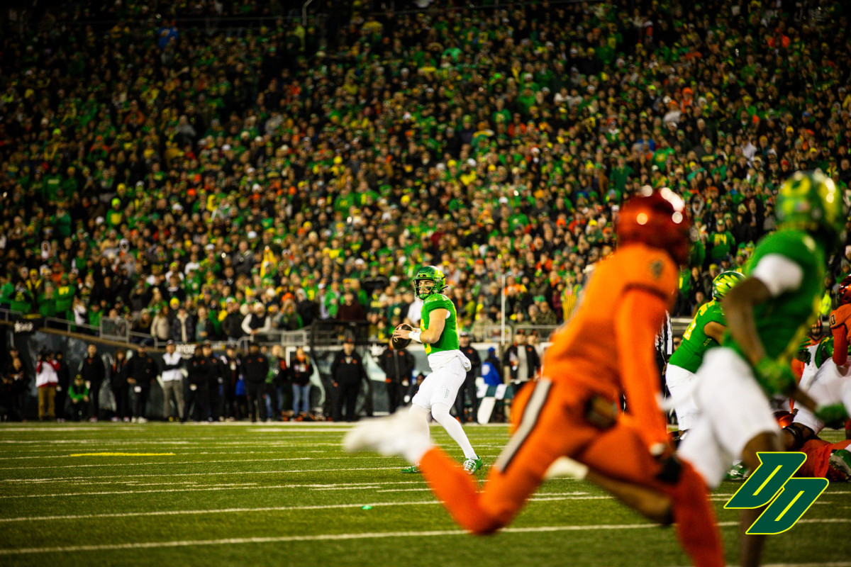 Oregon Ducks quarterback Bo Nix loads up for a pass against the Oregon State Beavers.