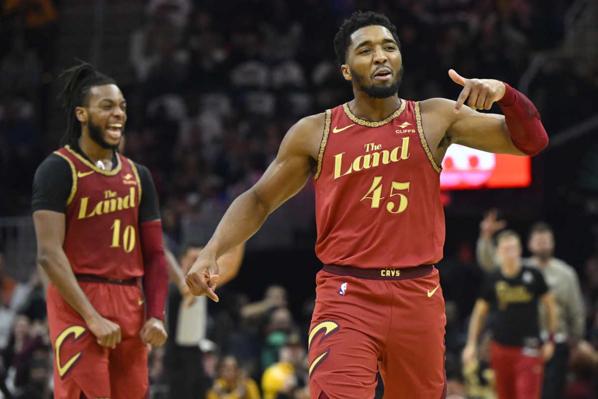 Nov 28, 2023; Cleveland, Ohio, USA; Cleveland Cavaliers guard Donovan Mitchell (45) and guard Darius Garland (10) celebrate in the second quarter against the Atlanta Hawks at Rocket Mortgage FieldHouse.
