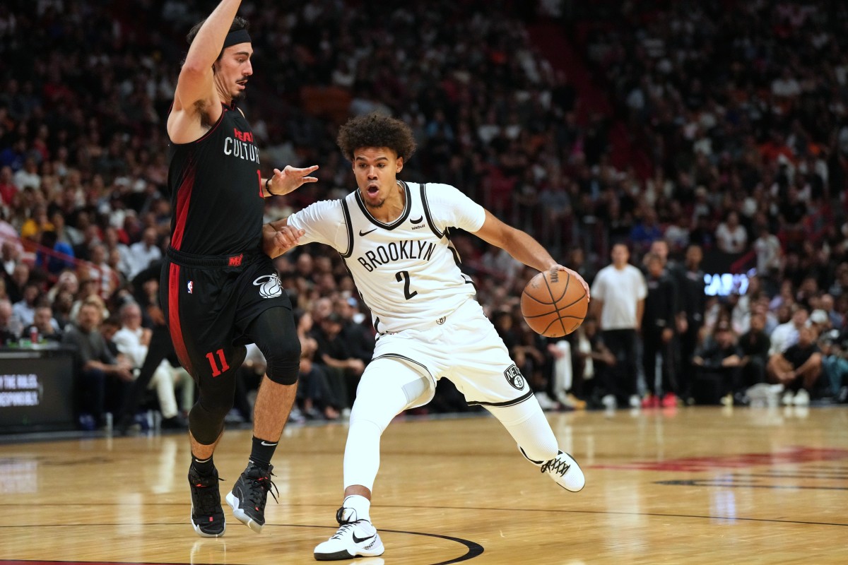 Miami Heat guard Jaime Jaquez Jr. (11) defends Brooklyn Nets forward Cameron Johnson (2)