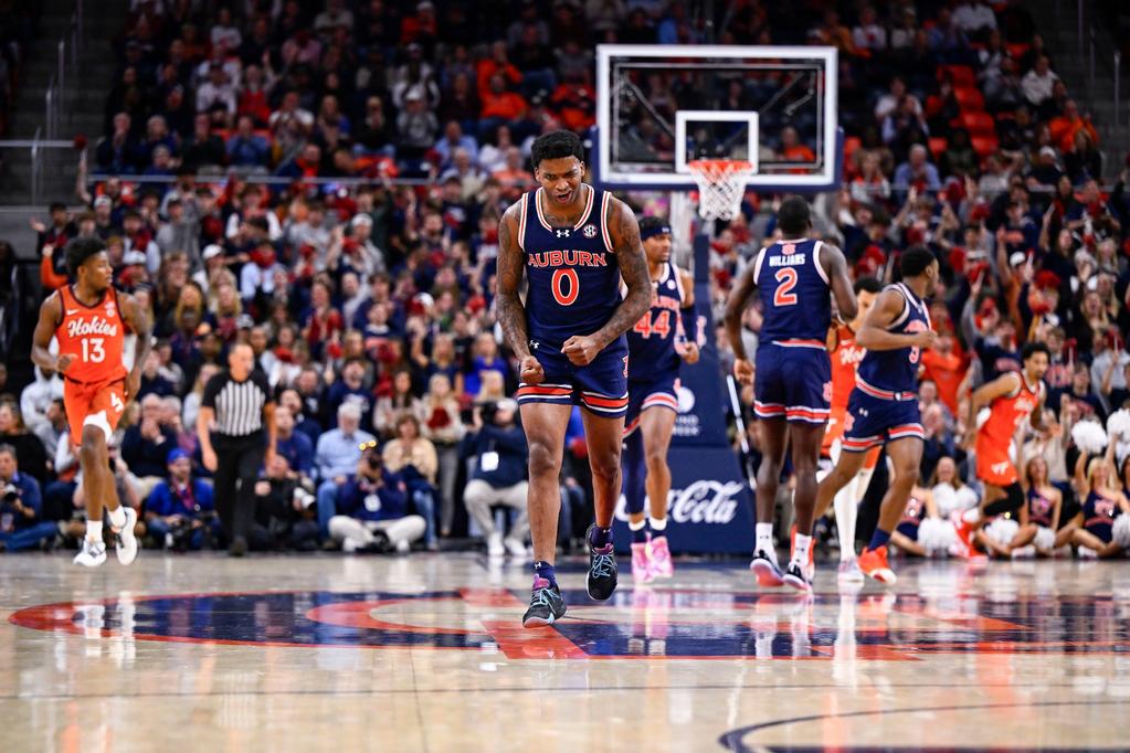 AUBURN, AL - NOVEMBER 29 - Auburn's K.D. Johnson (0) during the game between the Auburn Tigers and the Virginia Tech Hokies at Neville Arena in Auburn, AL on Wednesday, Nov. 29, 2023. Photo by Jamie Holt/Auburn Tigers