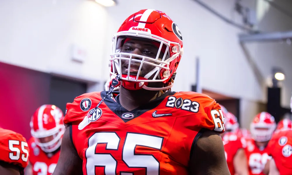 Mims walks out of the tunnel as Georgia prepares for a College Football Playoff game.