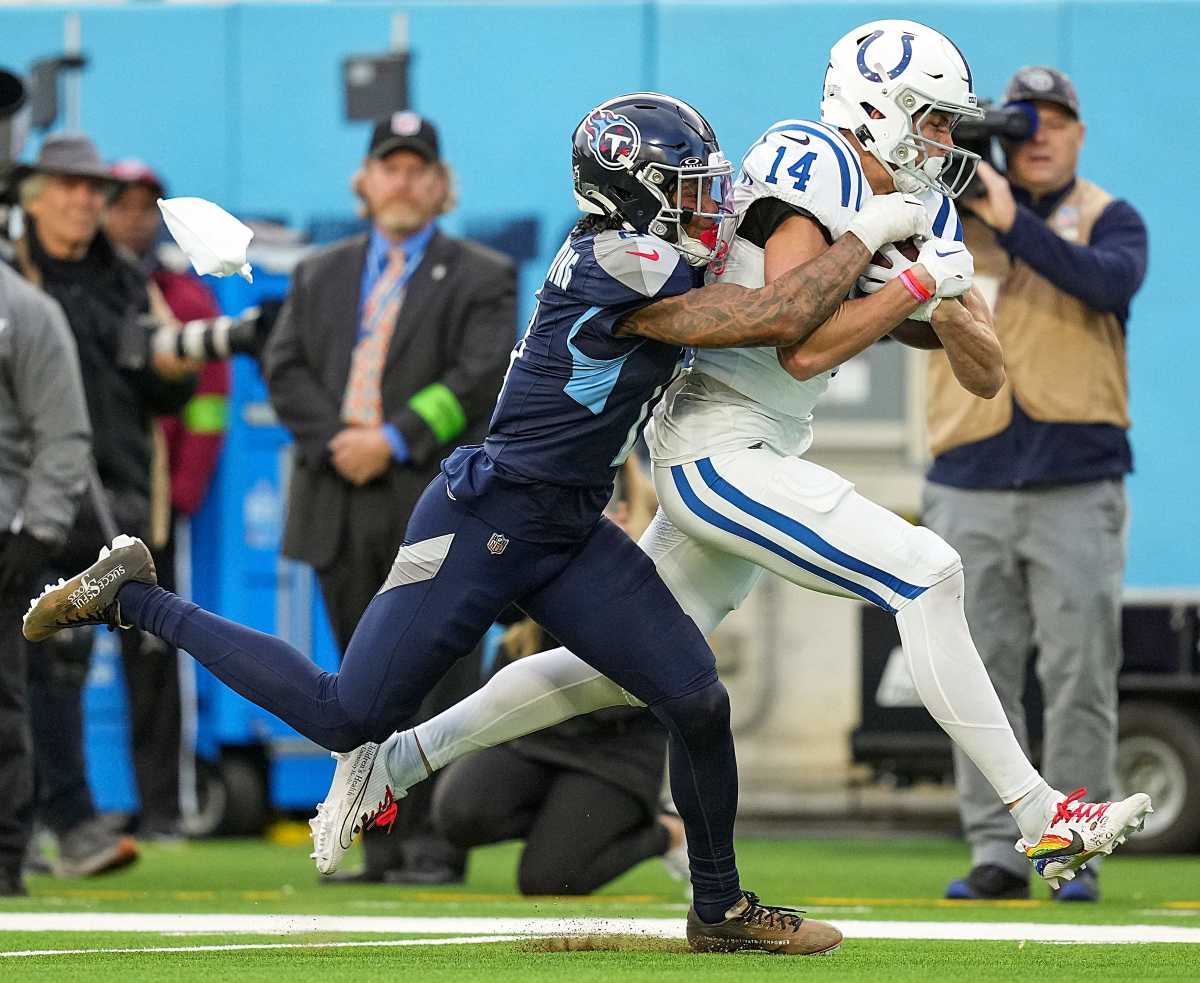 Indianapolis Colts wide receiver Alec Pierce (14) receives a long pass to put the Colts at first and goal in overtime Sunday, Dec. 3, 2023, at Nissan Stadium in Nashville, Tenn. The Colts went on to score to win in overtime, 31-28.