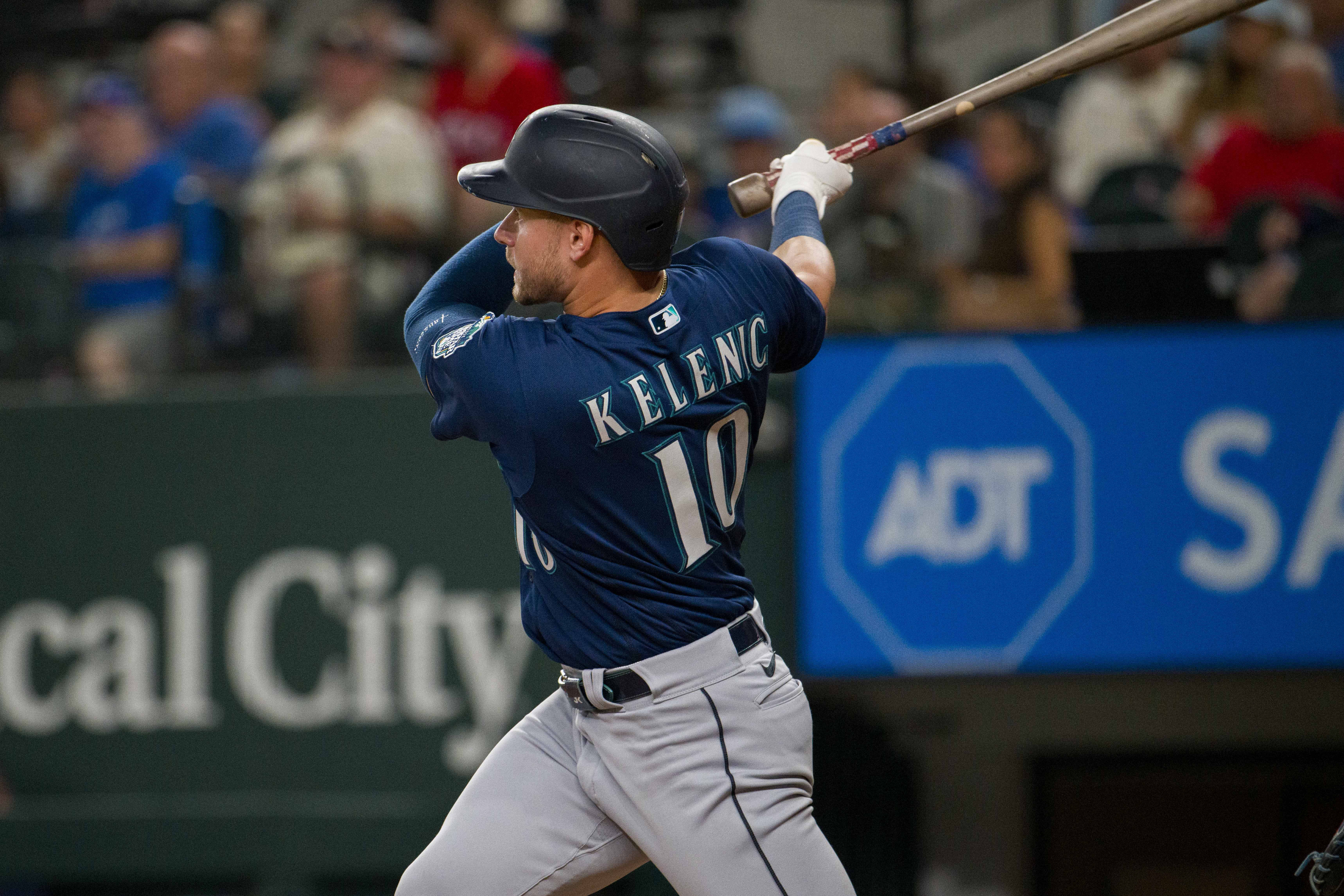 Sep 22, 2023; Arlington, Texas, USA; Seattle Mariners left fielder Jarred Kelenic (10) hits a double against the Texas Rangers during the fifth inning at Globe Life Field.