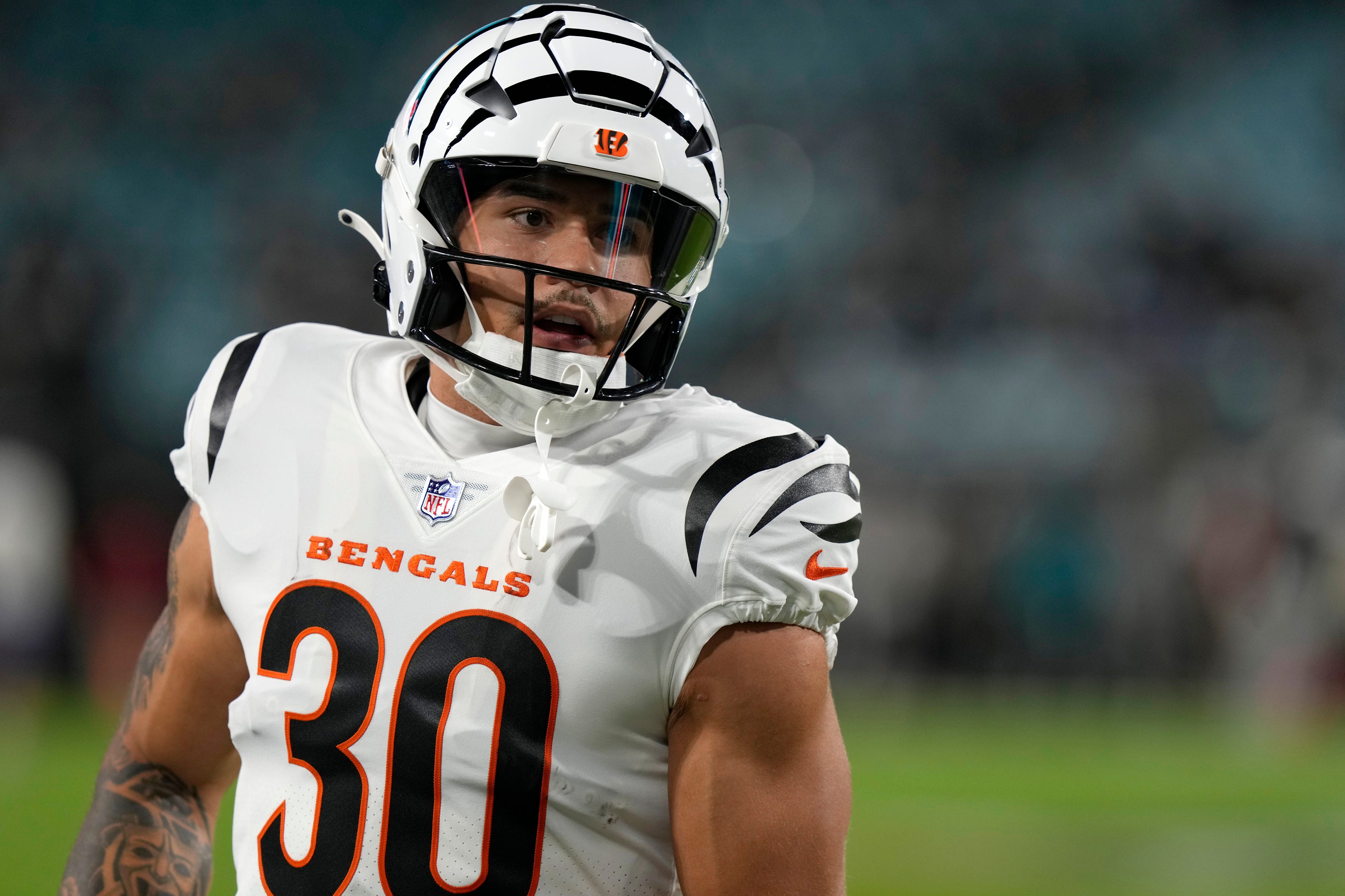 Cincinnati Bengals running back Chase Brown (30) takes the field for pregame warm up before facing the Jacksonville Jaguars at Everbank Stadium in Jacksonville, Florida Monday, December 4, 2023.