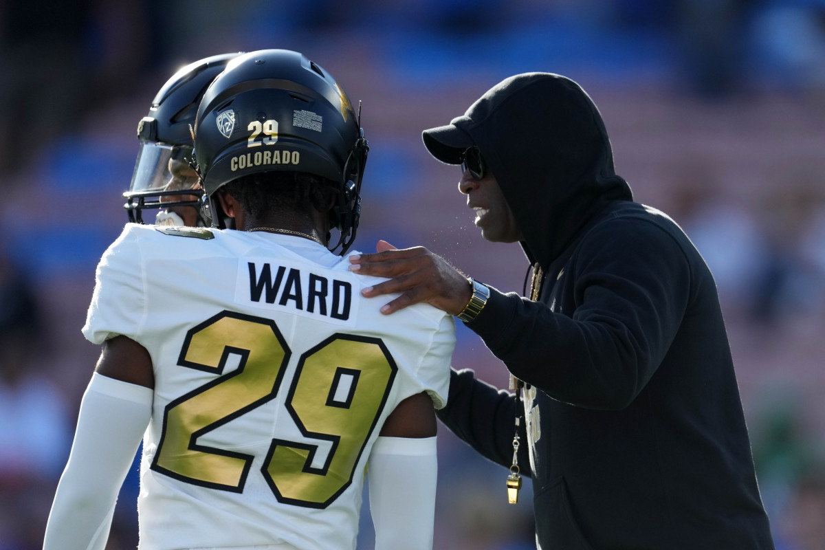 Colorado Buffaloes head coach Deion Sanders talks with safety Rodrick Ward (29) during the game against the UCLA Bruins at the Rose Bowl