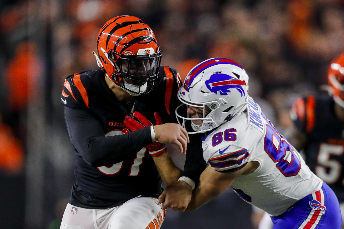 Nov 5, 2023; Cincinnati, Ohio, USA; Cincinnati Bengals defensive end Trey Hendrickson (91) pushes against Buffalo Bills tight end Dalton Kincaid (86) in the second half at Paycor Stadium.