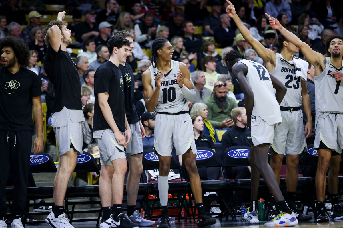 Nov 26, 2023; Boulder, Colorado, USA; The Colorado Buffaloes bench celebrates after a basket during the second half against the Iona Gaels at CU Events Center