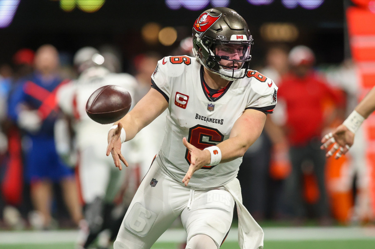 Dec 10, 2023; Atlanta, Georgia, USA; Tampa Bay Buccaneers quarterback Baker Mayfield (6) pitches the ball against the Atlanta Falcons in the first half at Mercedes-Benz Stadium. Mandatory Credit: Brett Davis-USA TODAY Sports