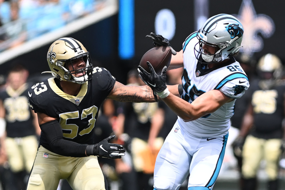 Carolina Panthers tight end Dan Arnold (85) catches a pass as New Orleans Saints linebacker Zack Baun (53) defends