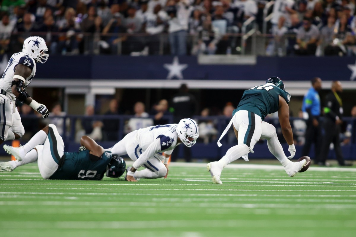 Fletcher Cox sacked Dallas Cowboys QB Dak Prescott, forcing a fumble that rookie Jalen Carter scooped up and scored from 42 yards out for the Philadelphia Eagles' lone touchdown in a 33-13 loss in Week 14.