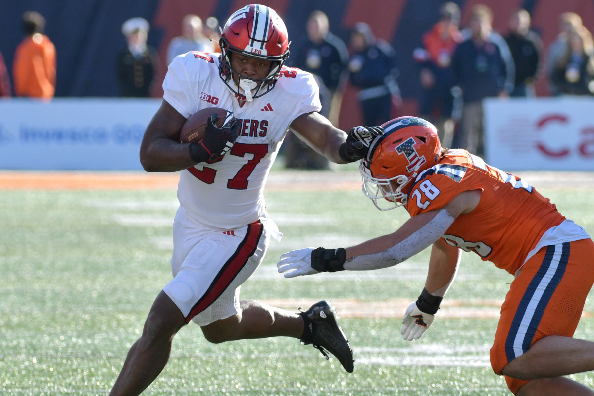 Nov 11, 2023; Champaign, Illinois, USA; Indiana Hoosiers running back Trent Howland is pursued by Illinois Fighting Illini linebacker Dylan Rosiek (28) during the second half at Memorial Stadium.
