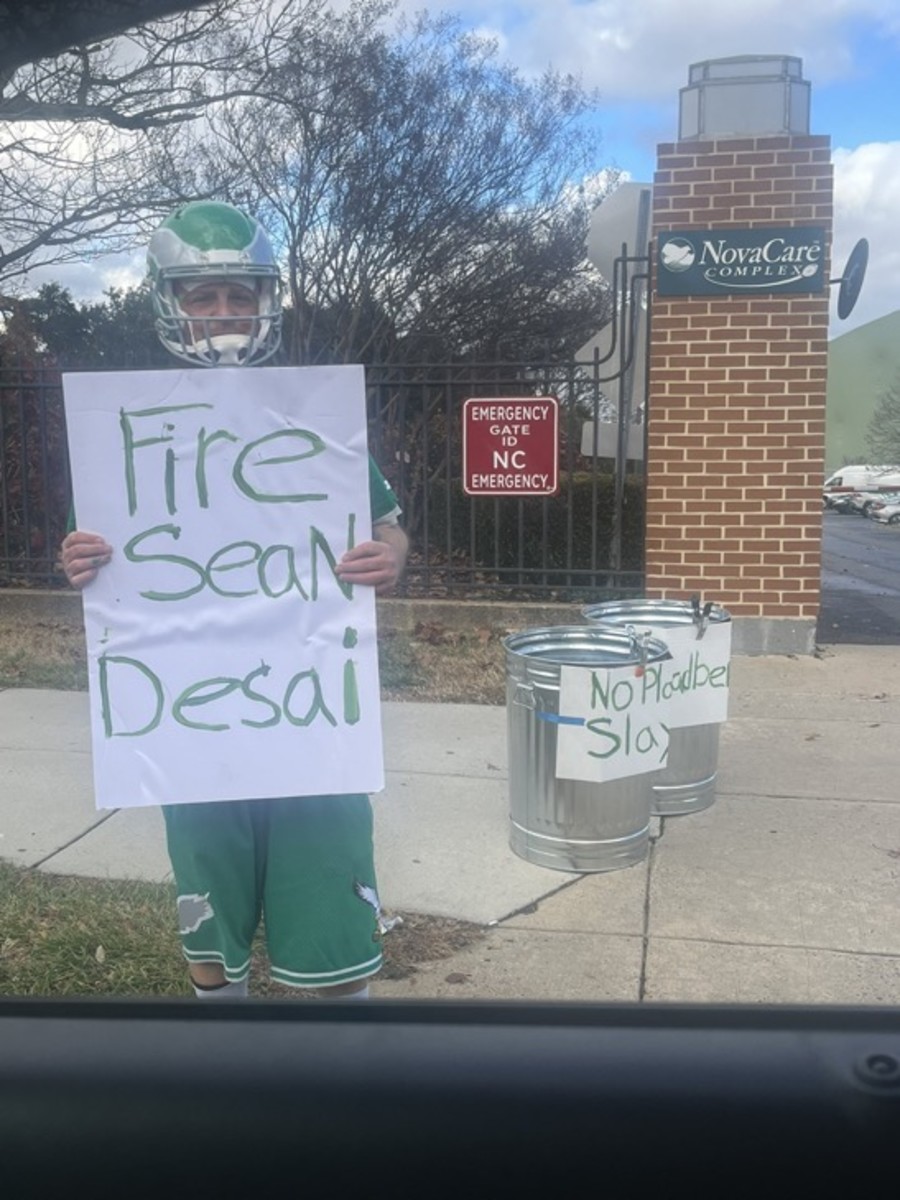 An Eagles fan makes his feelings known outside the team's training facility in South Philly.