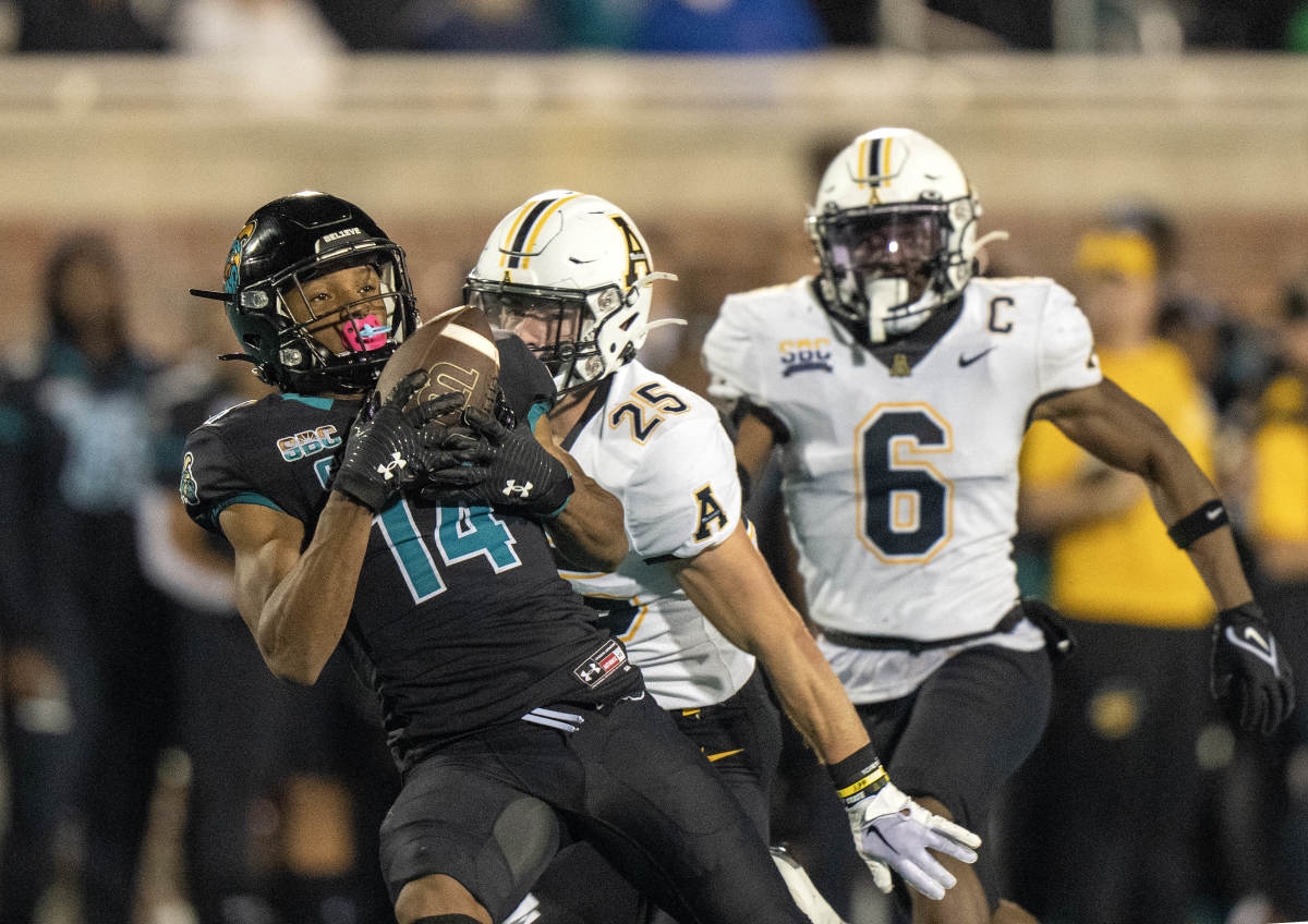 Jared Brown getting by two defenders and making an over-the-shoulder catch against App State (3rd Nov., 2022)