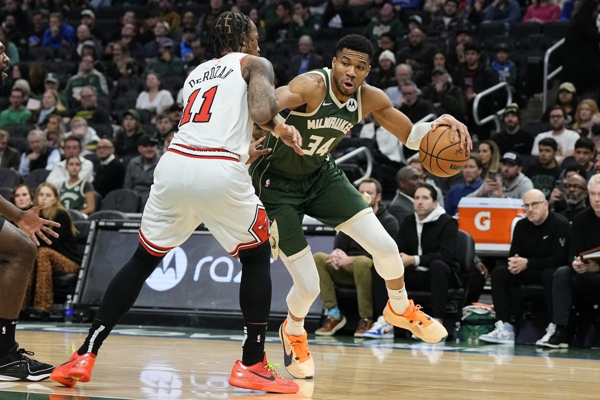 Milwaukee Bucks forward Giannis Antetokounmpo (34) drives for the basket against Chicago Bulls forward DeMar DeRozan (11) during the third quarter at Fiserv Forum. 