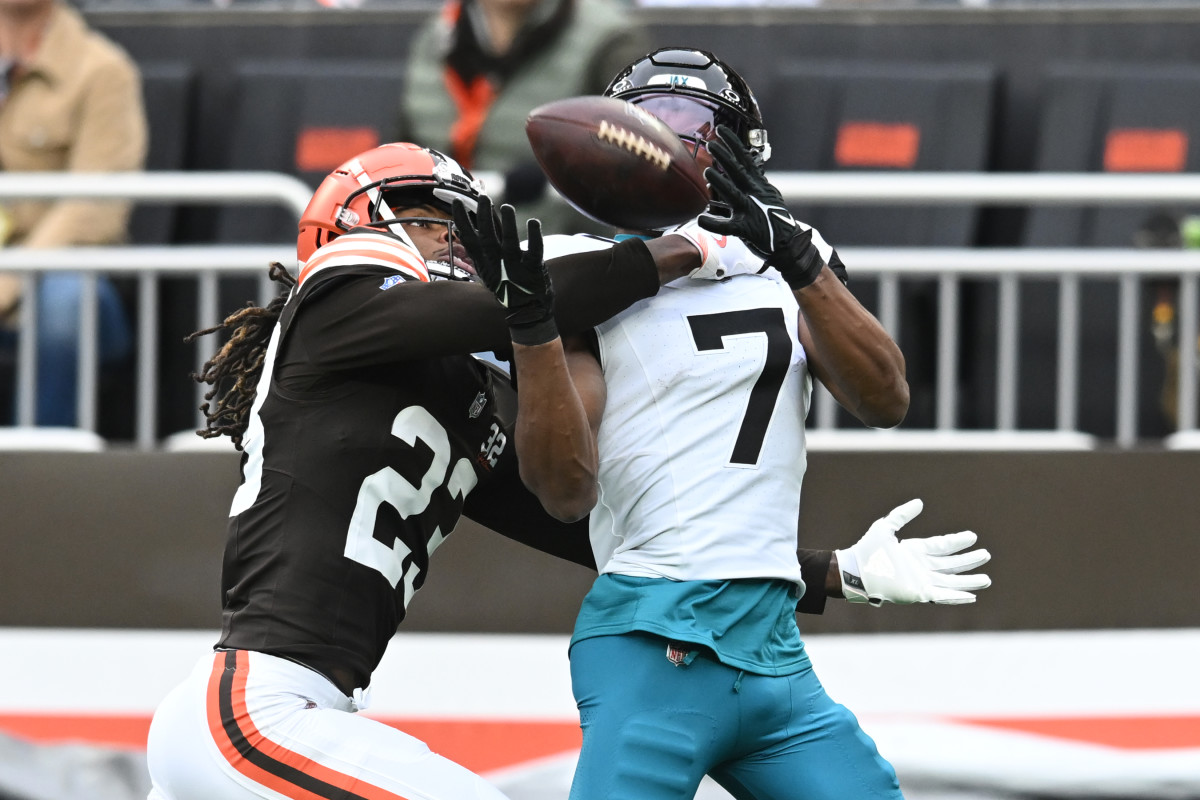 Dec 10, 2023; Cleveland, Ohio, USA; Cleveland Browns cornerback Martin Emerson Jr. (23) breaks up a pass intended for Jacksonville Jaguars wide receiver Zay Jones (7) during the first quarter at Cleveland Browns Stadium. Mandatory Credit: Ken Blaze-USA TODAY Sports