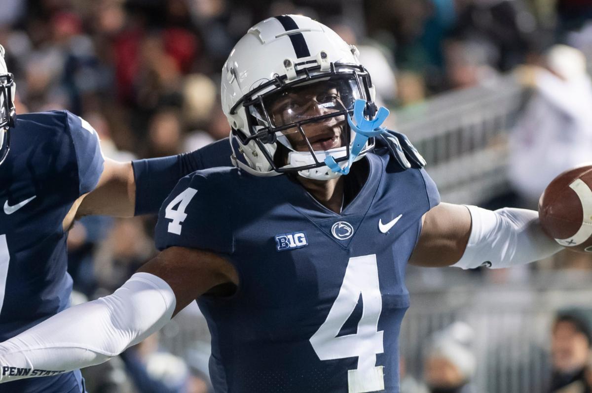 Penn State cornerback Kalen King (4) celebrates with Jaylen Reed (7) after intercepting a pass against Michigan State at Beaver Stadium on Saturday, Nov. 26, 2022, in State College. The Nittany Lions won, 35-16.