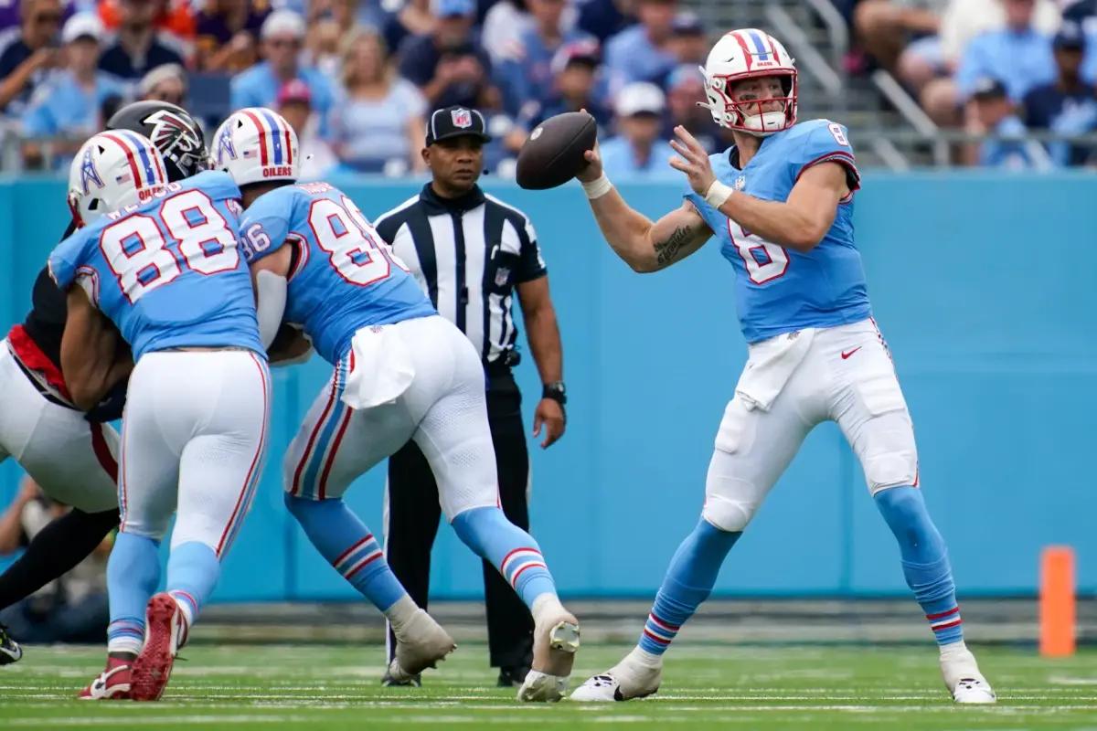 Tennessee Titans quarterback Will Levis (8) reacts after wide receiver DeAndre Hopkins (10) received a pass for a touchdown against the Atlanta Falcons during the first quarter at Nissan Stadium