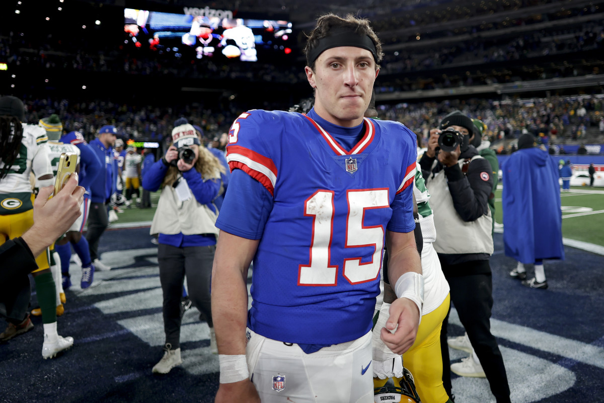 New York Giants quarterback Tommy DeVito walks off the field after beating the Green Bay Packers on Monday night.